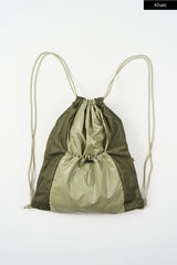 Metallic panel drawstring backpack