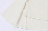 Flower brooch striped long-sleeved knit shirt