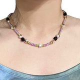 violet with black rose necklace