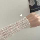  Monp pattern see-through ribbon knit cardigan