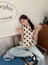 dotted sleeveless blouse