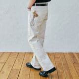 97 lc splatter bootscut denim pants ecru