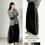 Tyrone two-line nylon wide pants