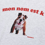 K プリントショースリーブTシャツ / K PRINTING SHORT-SLEEVED T-WHITE MELANGE