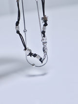 Swirl layered string star bracelet