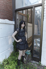 BABYDOLL DRESS IN BLACK CHECK