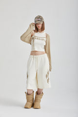 FLARE SLEEVELESS TOP