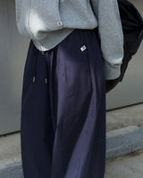 One-pin tuck strap balloon cotton pants
