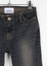 CURVED SLIM BOOTS CUT DENIM