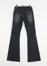 CURVED SLIM BOOTS CUT DENIM