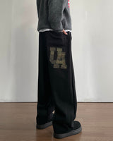 UAパッチボンディドスウェットパンツ