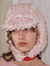 CURLY EARFLAP HAT IN CLOUD PINK