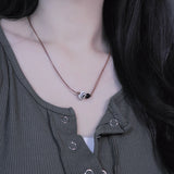 wood round swirl necklace