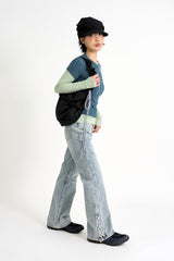 Sage cross lace denim pants