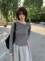 リズムダイアゴナルアンバランスボタンフード長袖Tシャツ