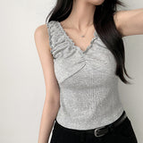 Carn spandex シャーリングフリルVネックノースリーブナシベスト