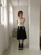 Buckle pleats midi skirt