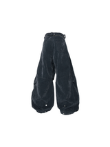 RELABEL Spatial Relations (Velvet Flowers) Muscular Line Segmentation Flocked Curved Blade Silhouette Dual-Form Denim Trousers