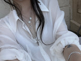 maria cross pearl necklace set