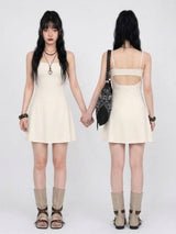 BACK OPEN FLARE MINI DRESS IN IVORY