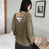 Seomit punching two-way eyelet back strap V-neck overfit long sleeve knit
