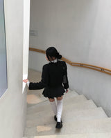 Low check button skirt