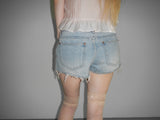 orange destroyed shorts