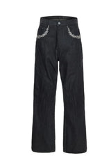 Embroidered Flared Raw Jeans