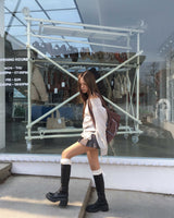 Low check button skirt