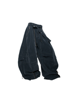 RELABEL Spatial Relations (Velvet Flowers) Muscular Line Segmentation Flocked Curved Blade Silhouette Dual-Form Denim Trousers