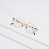 Knouun Round titanium glasses CODE. 102. F Rose Gold