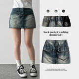 Nizu washing snap pocket denim miniskirt