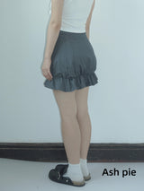 Smocked mini skirt with adjustable buckle