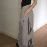 Dyoka Diagonal Track Nylon Two-Way Wide Pants