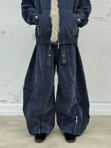 RELABEL Spatial Relations (Velvet Flowers) Muscular Line Segmentation Flocked Curved Blade Silhouette Dual-Form Denim Trousers