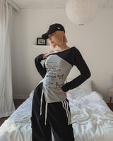 バターフルレタリングアンバランスオフショルダー長袖Tシャツ