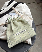 Pattern string pouch - mint stripe , M size