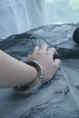 gold hole bangle watch