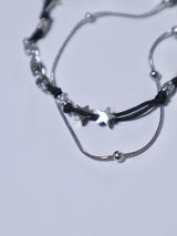 Swirl layered string star bracelet