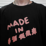 フェイクナッツ ステイン メイド イン アスタリスク ブラック ボクシー オーバーサイズ Tシャツ