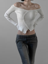 Curved off-shoulder knit