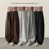 Curve incision string wide training pants