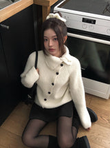 ジュークディアゴナルボタンハイネックニット