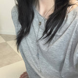 drop button necklace