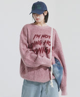 Lettering brush over knit