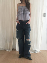 Dirty washed destroyed denim pants