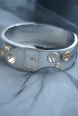 gold hole bangle watch