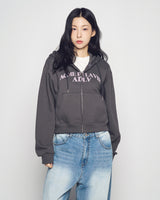25FW WOMAN アーチシェイプドロゴクロップナッピングフーディージップアップ