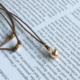 petit apple necklace