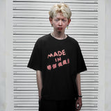 フェイクナッツ ステイン メイド イン アスタリスク ブラック ボクシー オーバーサイズ Tシャツ